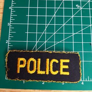 "POLICE" Vintage uniform patch (golden yellow on dark) Unfinished Edge